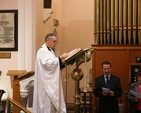 The Dean of St Patrick's and the Incumbent of the St Patrick's Cathedral group of parishes, the Very Revd Dr Robert MacCarthy reads the Gospel at the institution of the Revd Canon Mark Gardner as Vicar of the Cathedral group in St Catherine's Church, Donore Avenue.