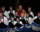 The Very Revd Canon John Flaherty with choristers that received awards from the RSCM (Royal School of Church Music) in Christ Church Cathedral.
