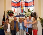 Mary and Bertie Johnson, Betty Lowe and Richard, Catherine and Annette Lowe at the window Betty decorated for the flower festival in St Patrick’s Church, Greystones. The window is dedicated to Betty’s grandfather, John Doyle, in honour of his bravery as a member of the RNLI. 