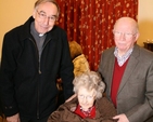 The Revd Harry Lew, Sylvia and Willie Clarke at the reception following the Mageough Chapel Carol Service