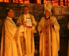 Lighting the Paschal Candle at Easter Vigil in Christ Church Cathedral. Left to right, the Archdeacon of Dublin, the Venerable David Pierpoint, the Dean of Christ Church Cathedral, the Very Revd Dermot Dunne and the Archbishop of Dublin, the Most Revd Dr John Neill.
