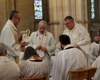 Archbishop Michael Jackson, Dean Dermot Dunne and the Revd Garth Bunting during the Maundy Thursday footwashing in the Chrism Eucharist at Christ Church Cathedral. 