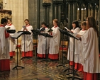 The cathedral choir singing at Chrism Eucharist on Maundy Thursday in Christ Church Cathedral.