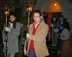 Torch bearers leading the procession from St Finian's Lutheran Church to the Adelaide Road Presbyterian Church as part of the Advent Walk of Light, an inter-church journey organised by the Dublin Council of Churches.