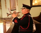 Bandsman Mark O'Connor of the Army No 1 Band plays the Last Post at the Service of Commemoration and Thanksgiving to mark ANZAC day in St Ann's Dawson Street.