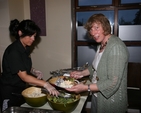 Pictured is Janet Grey (right) receiving food at the Narraghmore and Timolin with Castledermot and Kinneagh Parish BBQ in Crookstown Inn.