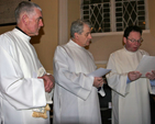 Archdeacon David Pierpoint, the Archbishop of Dublin, the Most Revd Dr Michael Jackson, and Revd Anthony Kelly as Revd Kelly reads the declaration at his Service of Introduction as Bishop’s Curate of the parishes of Holmpatrick and Kenure with Balbriggan and Balrothery in St George’s Church, Balbriggan.