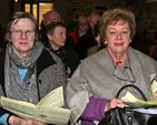 Preparing to enjoy the 4 Cellos concert in Calary Church were Annick Smith and Madaline Irwine. 
