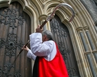 The Most Revd Dr Michael Jackson, Archbishop of Dublin and Bishop of Glendalough, knocking on the door of Christ Church Cathedral prior to his enthronement.