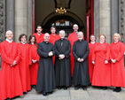The choir of St Ann’s Church, Dawson Street, with the Archbishop of Dublin, the Most Revd Dr Micheal Jackson, and the Vicar and Curate of St Ann’s, Revd David Gillespie and Rev Martin O’Connor following the three–hour Good Friday service in the church. 