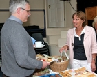 Margaret Davis serves tea to Revd Ken Rue at Wicklow Parish Fete. 