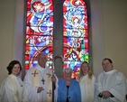 Bernie Threlfall, who commissioned the St Francis stained glass window, is pictured with the Revd Anne-Marie O'Farrell, Archbishop John Neill, the Revd Sonia Gyles and Martin O'Kelly, CITI student, at the service to dedicate the window in Sandford Parish Church. 