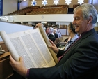 Rt Revd Michael Jackson viewing a  Hebrew Scroll at the Orthodox Synagogue, Terenure.