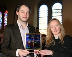 David Bremner, receiving an award for his work as organist at Sandford Parish, pictured with Revd Sonia Gyles. Photo: David Wynne