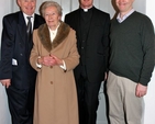Canon Mark Gardner with his mother, Isabel, and brothers Stephen and John following his institution as rector of the new parish of St Catherine and St James with St Audoen. 