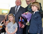 The President and Mrs Higgins were presented with gifts by two younger members of the parish of Holy Trinity, Killiney, at the official opening of the refurbished parish centre, the Carry Centre. 