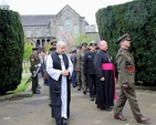 Archbishop Michael Jackson is led through the military guard of honour from the Church of the Most Sacred Heart to the Memorial for the 1916 Leaders at Arbour Hill, Dublin, during the annual 1916 Commemoration which took place this morning (Wednesday May 8). 
