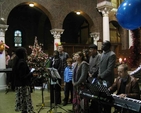 The Discovery Gospel Choir singing at the International Carol Service in St George’s and St Thomas’ Church.