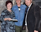 Susie Keegan and Greg Fromholz of 3Rock Youth were presented with parting gifts by Quentin Heaney of the 3Rock oversight team at a leaving party in the Crypt of Christ Church Cathedral. 