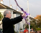 Archbishop Michael Jackson cuts the ribbon officially opening Glenageary Killiney National School’s new outdoor classroom. 