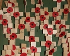 Crosses to remember the fallen at the Armistice Day Service, St Ann's Church, Dawson St.