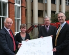 Pictured with the plans for the refurbishment of the residential block of the Church of Ireland Theological Institute are (left to right) David Young from Hamilton Young Architects, Grace Dempsey, Robert Neill representing the Representative Church Body and the Revd Dr Maurice Elliott, Director of the Church of Ireland Theological Institute.