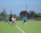 St Paul's Glenageary (in Pink) on the attack against Rathfarnham (Blue) in the Diocesan Inter Parish Hockey Tournament. St Paul's won the match 2-0.