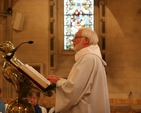 The Revd Canon Neil McEndoo reads the lesson at Chrism Eucharist in Christ Church Cathedral.