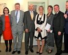 Education minister Ruairi Quinn with representatives of the Church of Ireland College of Education and the National Museum of Ireland at the the Kildare Place Society & Schooling in the Nineteenth Century exhibition in the National Museum of Ireland Collins Barracks.
