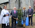President Michael D Higgins planted a yew tree in the grounds of the Church of St John the Baptist in Clontarf before the service to commemorate the 1,000th anniversary of the Battle of Clontarf. Also pictured are the Rector, the Revd Lesley Robinson; Mrs Sabina Higgins; and select vestry member, Mr John Patten. 