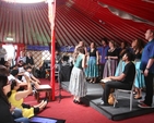 The Discovery Gospel Choir in song in the Faith Space tent at the Dún Laoghaire Festival of World Cultures.