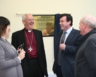 Minister Brian Lenihan shares a joke with Archbishop John Neill, principal Sandra Moloney and Revd Paul Houston at the official opening of Castleknock National School's new extension.