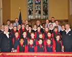 Members of the 6th RI Company of the Girls’ Brigade, including Captain Isobel Henderson (far left, front row), pictured at the Palm Sunday service of thanksgiving for the company's centenary in Holy Trinity Church, Rathmines.
