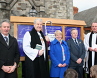 Leslie Blackwell; the Archbishop of Dublin, the Most Revd Dr Michael Jackson; Olive Cooper, church warden and wife of the late Cecil Cooper; North Strand rector, Revd Roy Byrne; and church warden Mervyn Denner at the dedication of a new noticeboard for North Strand Church and St Columba’s School. The noticeboard was erected in memory of Cecil Cooper and made by Leslie Blackwell.