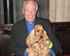 Fr Brian O’Sullivan, Chairman of Peata with ‘Willow’ at the Peata Carol Service in Christ Church Cathedral.