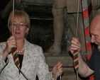 Minister Mary Hanafin gets to grips with the bells alongside Bellmaster Leslie Taylor at the Rediscover Christ Church Book Launch.