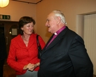 The former Archbishop of Armagh, the Rt Revd Robin Eames with Heather Waugh at a reception following the Delgany Harvest Festival.