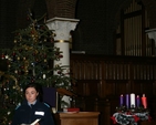 Trainee Garda Laura Conlan reads a lesson at the community carols in St Georges and St Thomas Church.