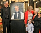 A portrait of former Dean of Christ Church Cathedral, the Very Revd Desmond Harmon, was unveiled this afternoon. Pictured are the current Dean, the Very Revd Dermot Dunne, Sue Harmon and her grandson, and artist Olivia Bartlett. 