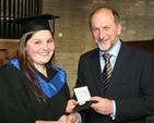 Jennifer Veighey from Rathcoole, Dublin receives the Vere Foster Gold Medal as the student who received the highest marks in Teaching Practice from Declan  Kelleher, President of the INTO at the graduation day celebrations at the Church of Ireland College of Education.