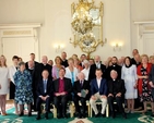President Michael D Higgins with members and friends of Cumann Gaelach na hEaglaise during their visit to Áras and Uachtaráin to mark the 100th anniversary of the Irish Guild of the Church of Ireland. 