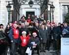 Cantairí Avondale prepare to sing at the community carol singing at the Mansion House in Dublin with representatives of the Council for Mission, the Archdiocese, Dublin’s Lord Mayor and the readers.