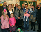 The new rector of the grouped parishes of Donoughmore and Donard with Dunlavin, Revd Olive Henderson (centre) with of her children, their partners and some of her 16 grandchildren following her institution at St Nicholas’ Church, Dunlavin. 