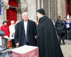 Archbishop Diarmuid Martin and Archbishop Michael Jackson chat before collecting for charity during the Black Santa Appeal outside St Ann’s Church on Dawson Street. 