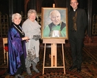 Mrs Olivia Bartlett (artist), Ms Iris Sherwood and Dean Dermot Dunne with the newly unveiled portrait of former dean, the Very Revd Tom Salmon, in Christ Church Cathedral on Sunday February 3. (Photo: David Wynne)