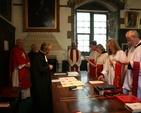 Reading the declarations. Pictured on the right (background to foreground) reading the declarations prior to their ordination are David MacDonnell, Ruth Elmes, Suzanne Harris and Niall Stratford.