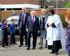 President Michael D Higgins and his wife Sabina arrive at the Church of St John the Baptist for the service commemorating the 1,000th anniversary of the Battle of Clontarf. They were greeted by the Rector, the Revd Lesley Robinson and select vestry member, John Patten and were given a guard of honour by the local Cubs and Scouts. 