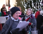 Alice Leahy of Trust reading at community carols at the Mansion House oraganised by the Diocesan Council for Mission and the RC Archdiocese of Dublin Year of Evangelization.