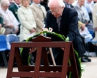 President Michael D Higgins lays a wreath at the plaque in memory of those Irishmen and Irishwomen who have died in past wars or on service with the United Nations.