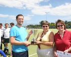 Bray Captain Simon O'Connor receives the Archbishop's Cup for his team winning the Diocesan Inter-Parish Hockey Tournament. Presenting the trophy is the Revd Gillian Wharton and fellow organiser of the competition, the Revd Anne Taylor.